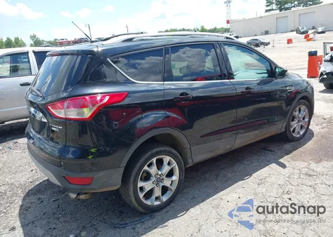2014 Ford Escape Titanium z USA, uszkodzony, nr VIN 1FMCU9J96EUA26469